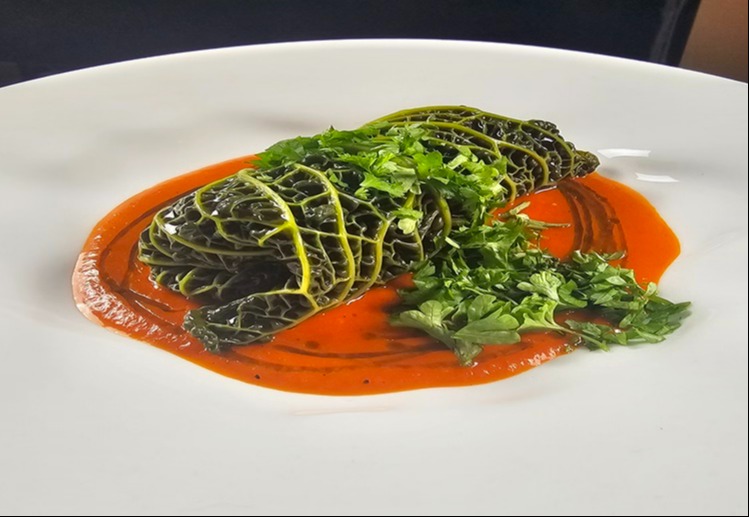Stuffed Savoy Cabbage Leaves with Roasted Pepper and Tomato Sauce